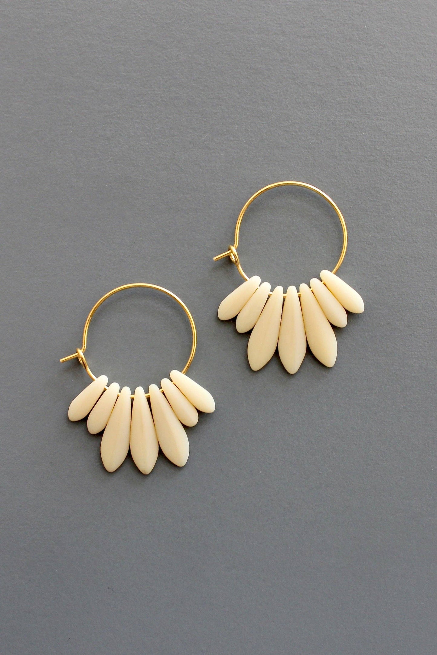 Mini matte cream colored hoop earrings