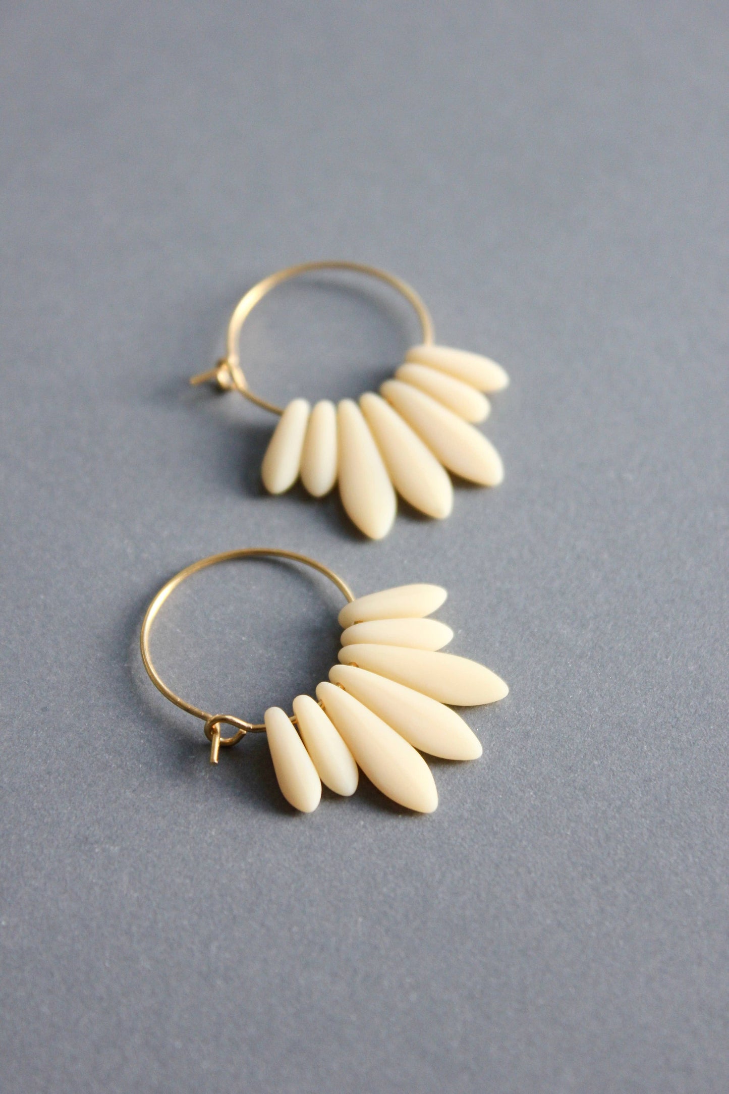 Mini matte cream colored hoop earrings