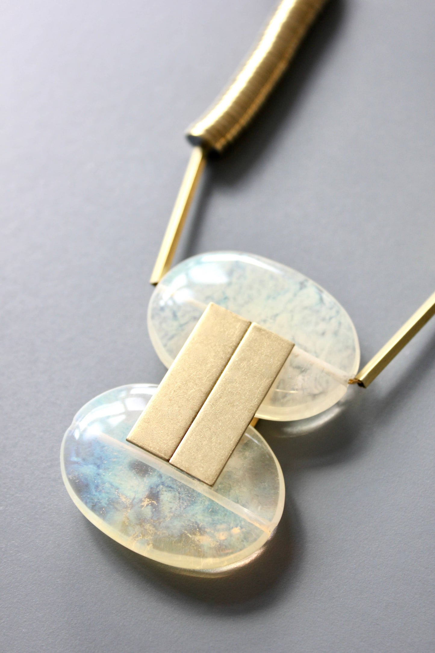 Quartz and gold hematite geometric necklace