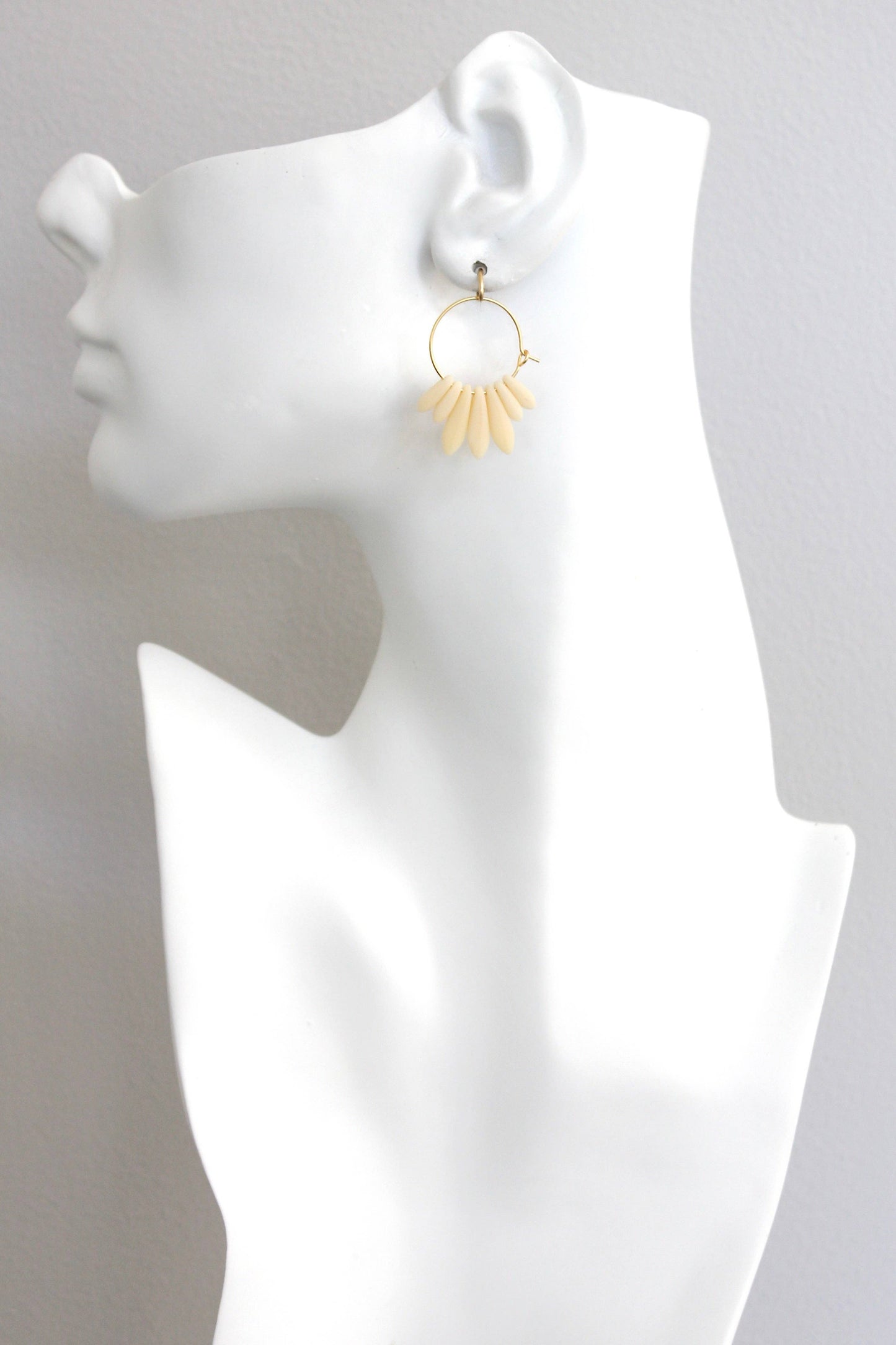 Mini matte cream colored hoop earrings