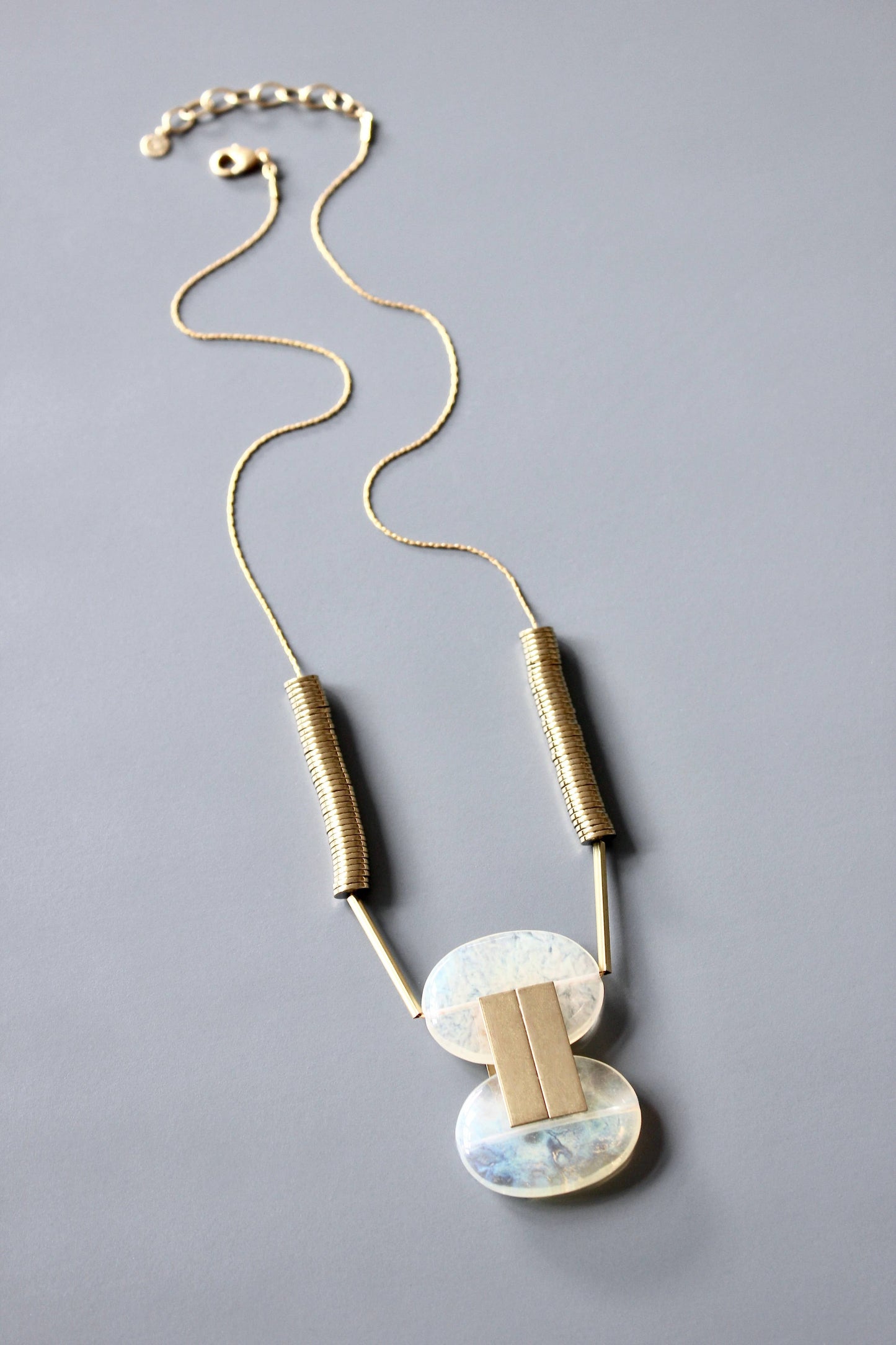 Quartz and gold hematite geometric necklace